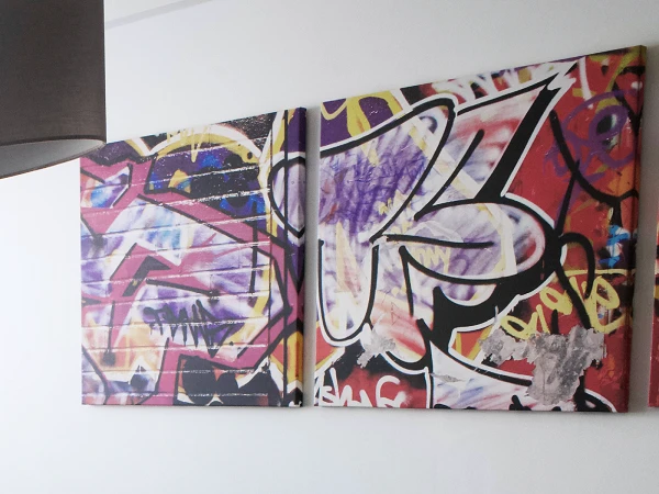 Graffiti-Kunst an weißer Bürowand